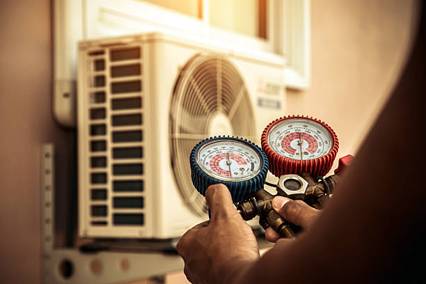 Professional Heat Pump Repair technician working in Richmond Hill, NY